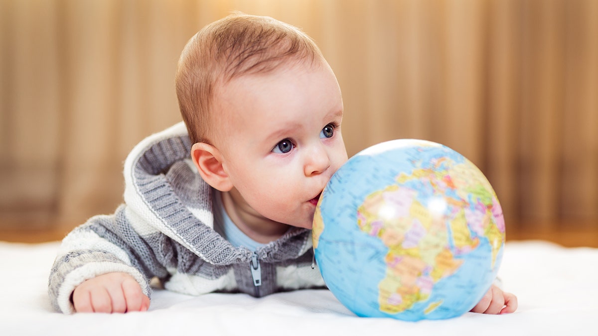 Baby with globe baby name trending