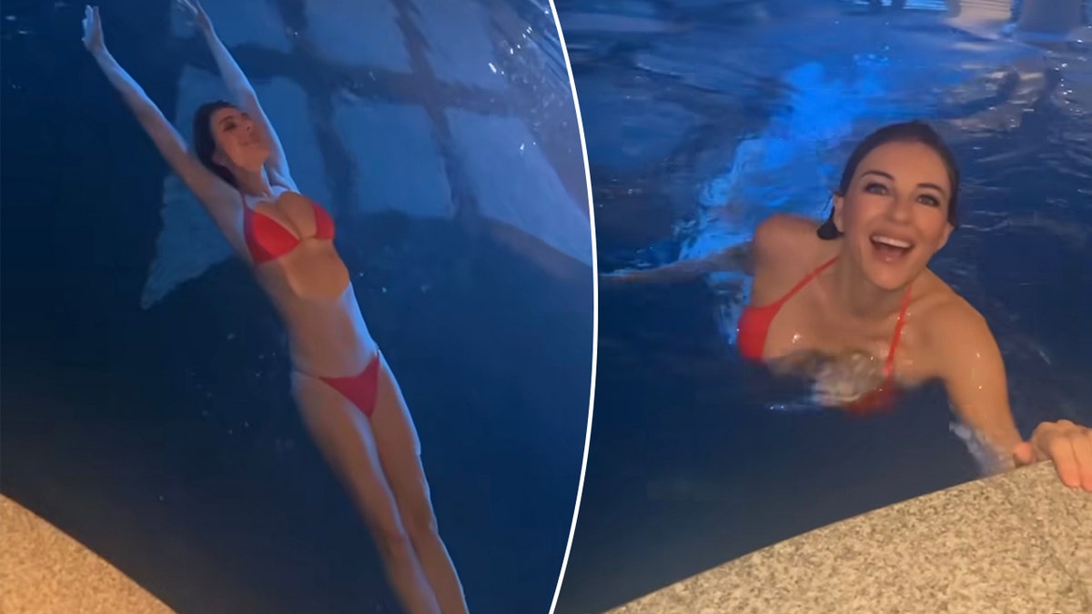 Elizabeth Hurley in a red bikini floats int he pool split Elizabeth Hurley laughs as she comes to the edge of the pool