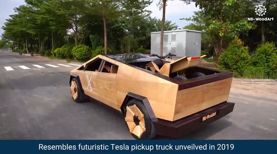 A man created a DIY Tesla Cybertruck out of wood
